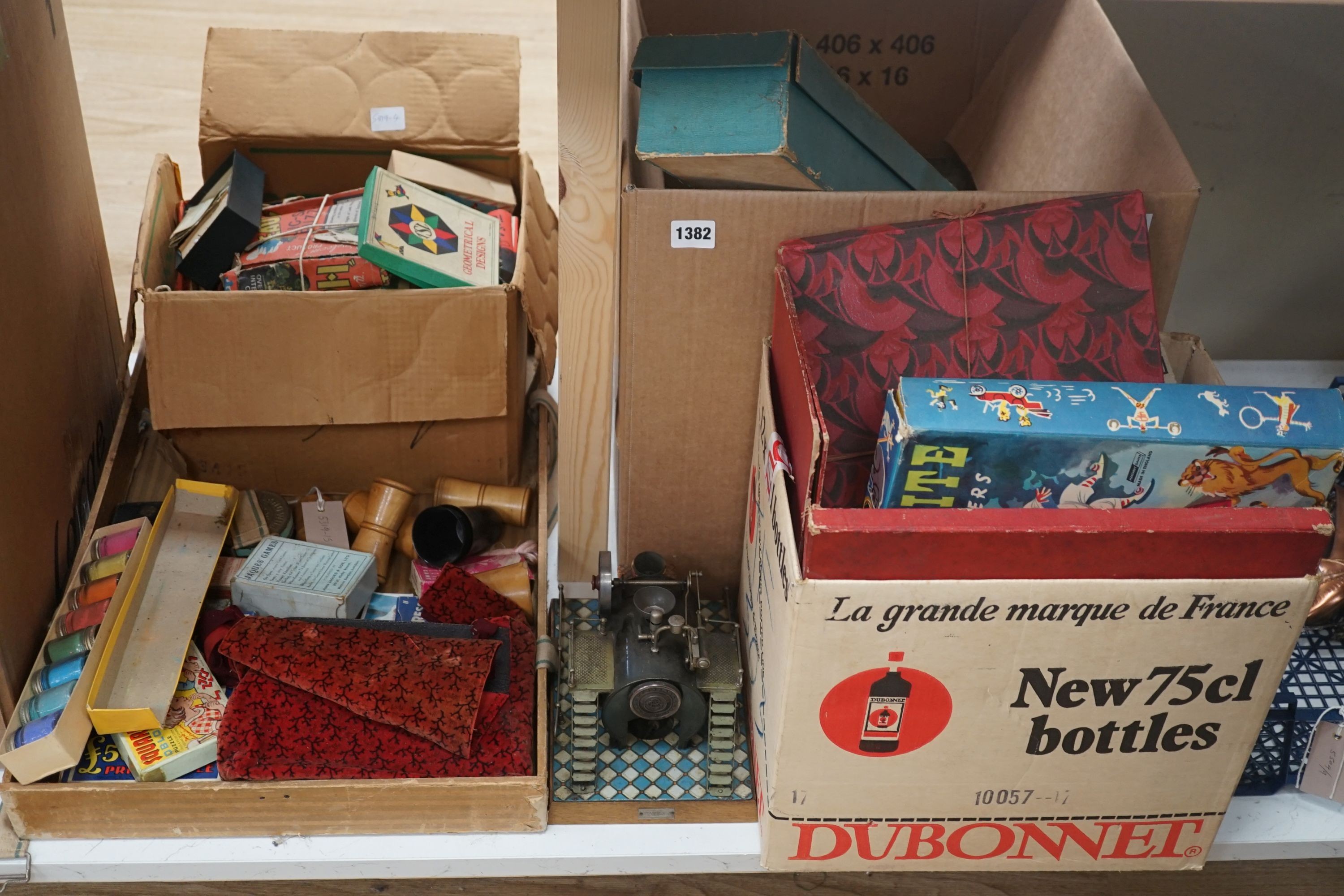 A Bing tinplate stationery engine, a boxed Jaques ‘The Angelo’, a toy fort and lead soldiers, a steam engine and other various toys and board games